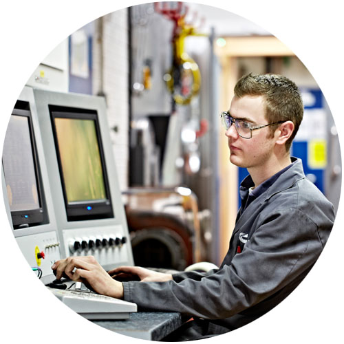 employee working at a cummins lab