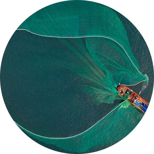 fishing boat with net in water