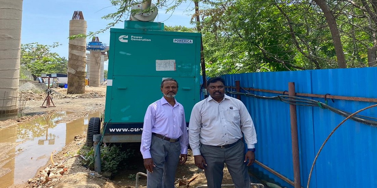 MDS workers in front of Generator