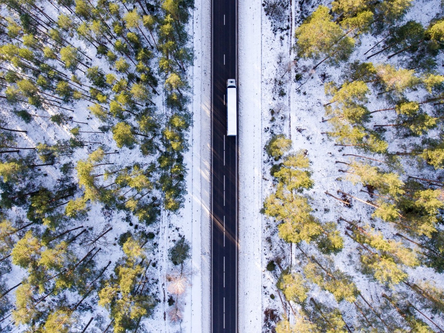 truck driving on road 