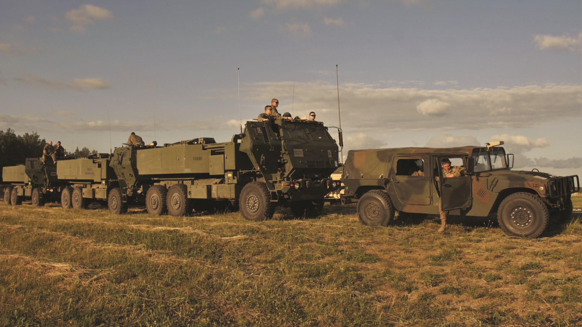 Land Defense vehicles in a field