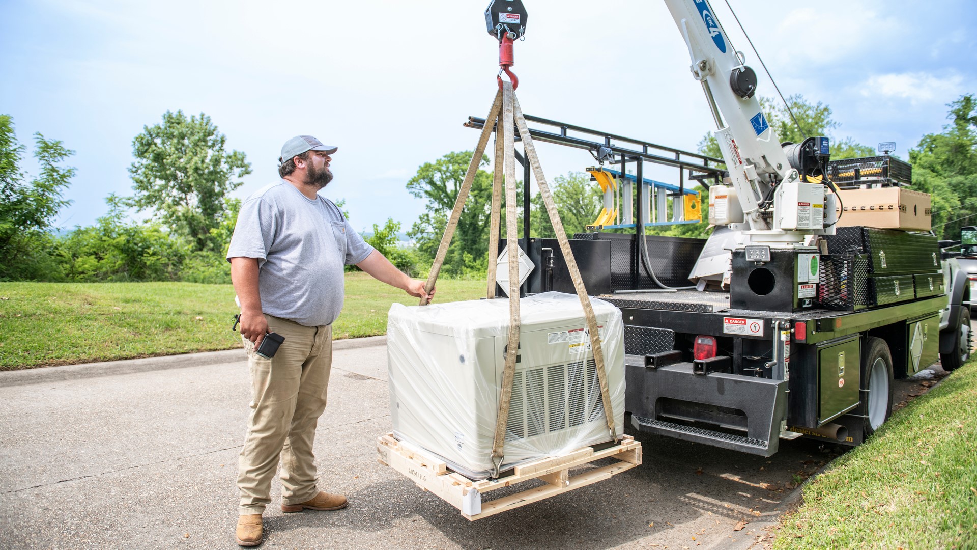 Truck towing a Cummins power generation product