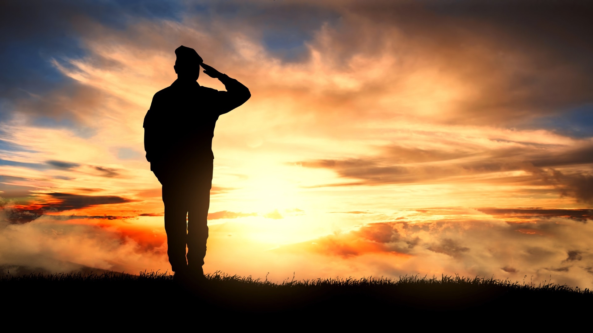 sunrise with soldier saluting