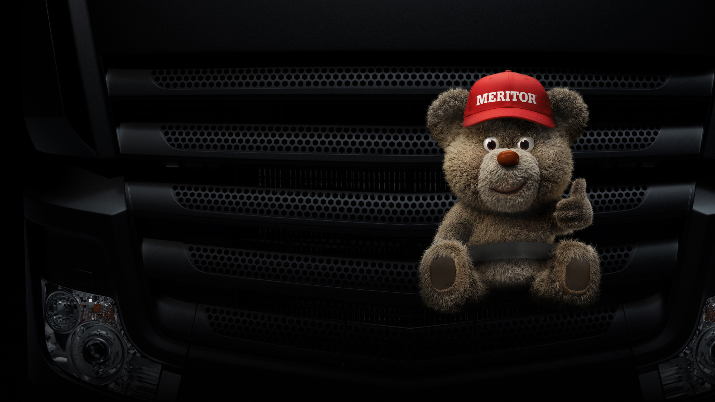 Meritor bear in front of a truck