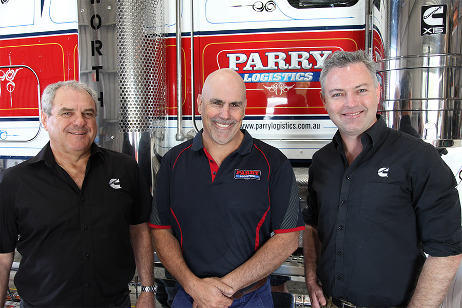 Cummins employees with Greg Parry
