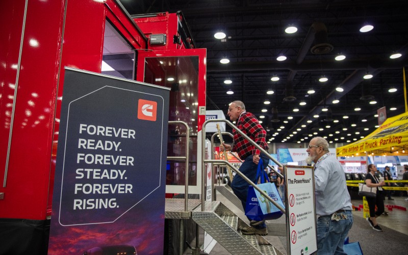 People entering Cummins booth at the Mid-America Trucking Show