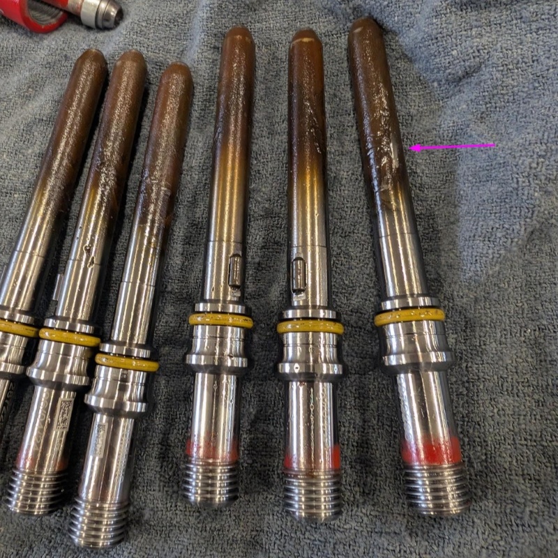 untreated injectors showing wear and tear
