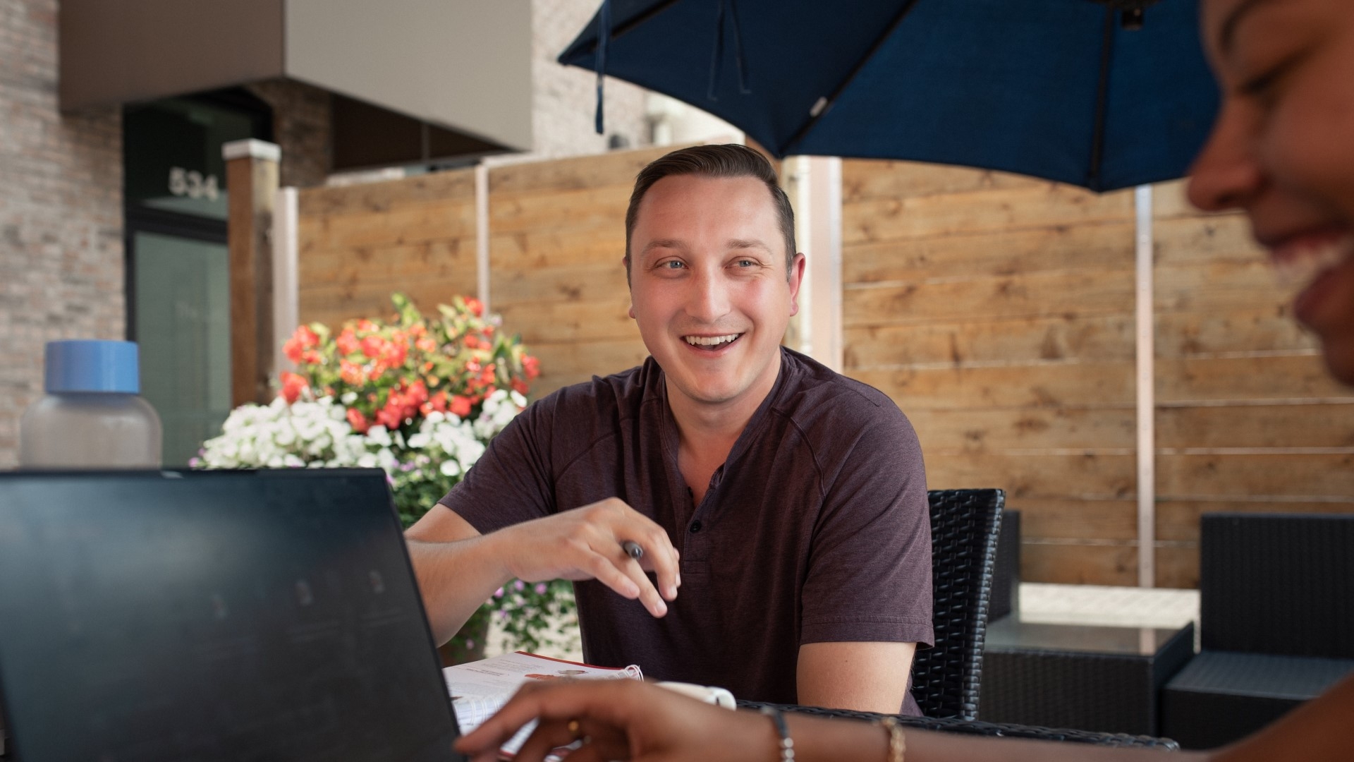 man sitting at table