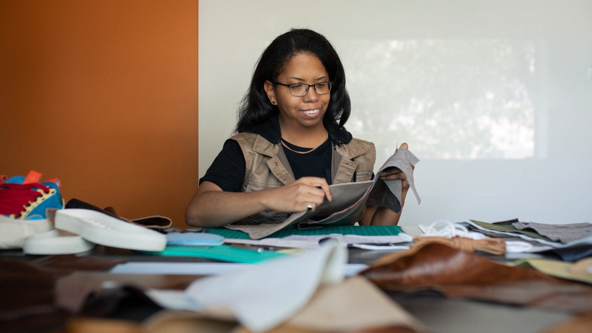 Shavonn testing different materials of fabric