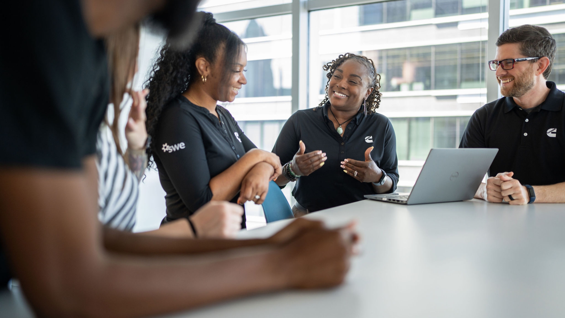 Meko Taylor meeting with colleagues in Atlanta during her Cummins community partnership and leadership work.