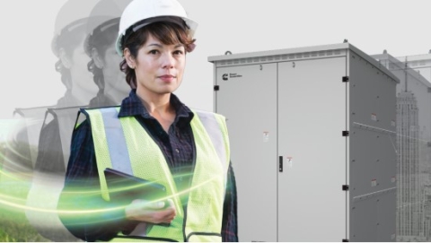Woman in front of a transfer switch