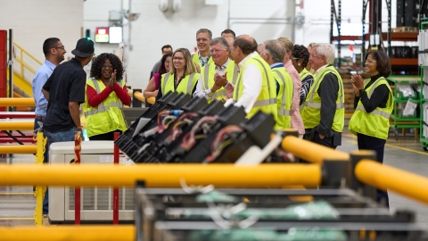 company leadership at factory