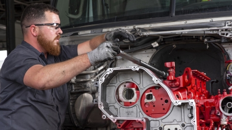 technician working on engine