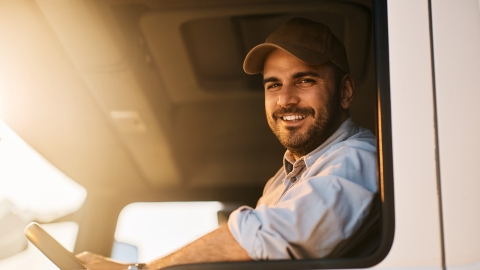 Man in truck smiling