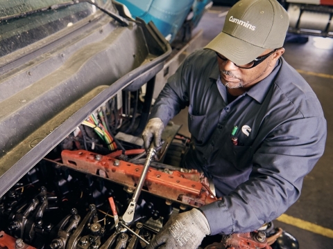 Cummins technician working on a Valveset
