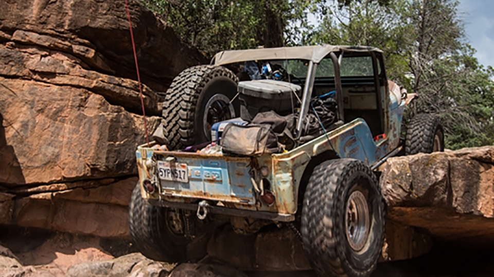Jeep driving on rocks