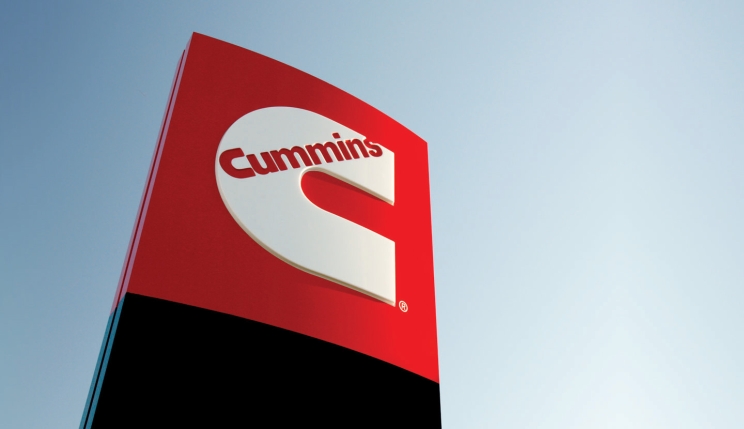 Cummins logo signage against a blue sky