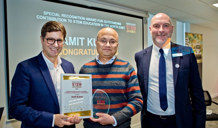 Amit Kumar receiving his STEM award