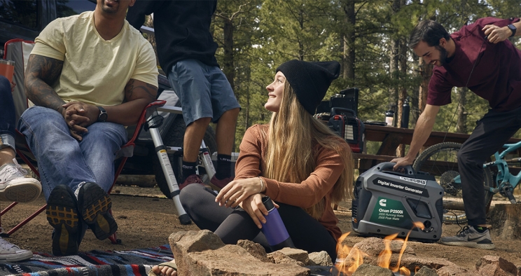 People sitting around a campfire