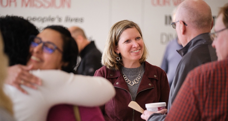 Jen Rumsey talking to employees