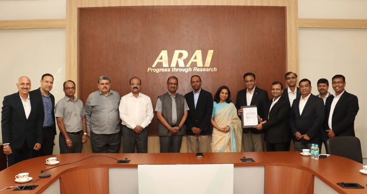 group of people holding signed contract