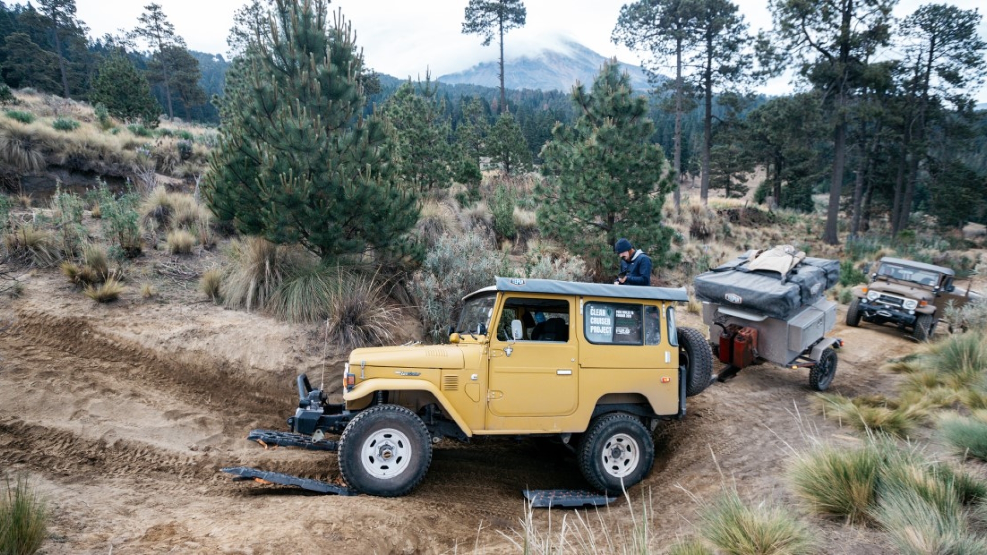 The Clean Cruiser Project’s re-powered Land Cruisers with Pico de Orizaba in the background on what would be a harrowing trip up the mountain.