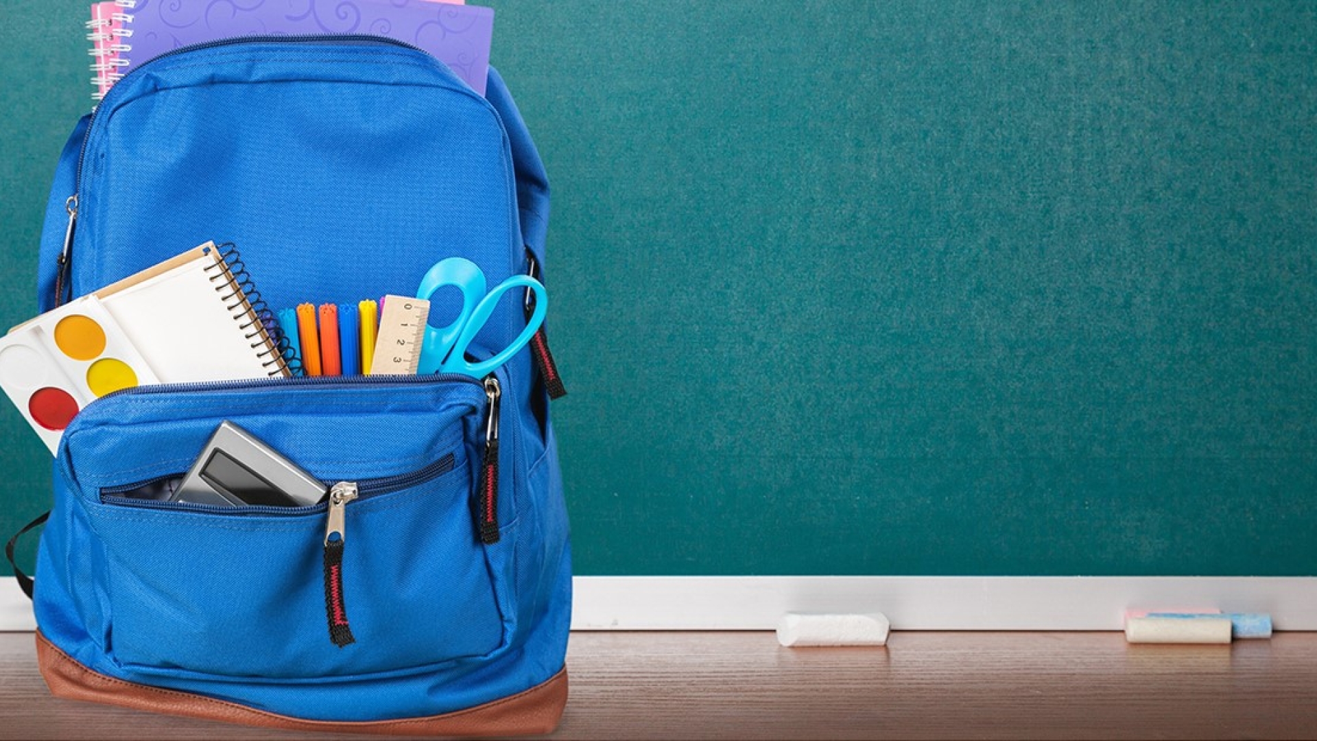 School backpack on desk