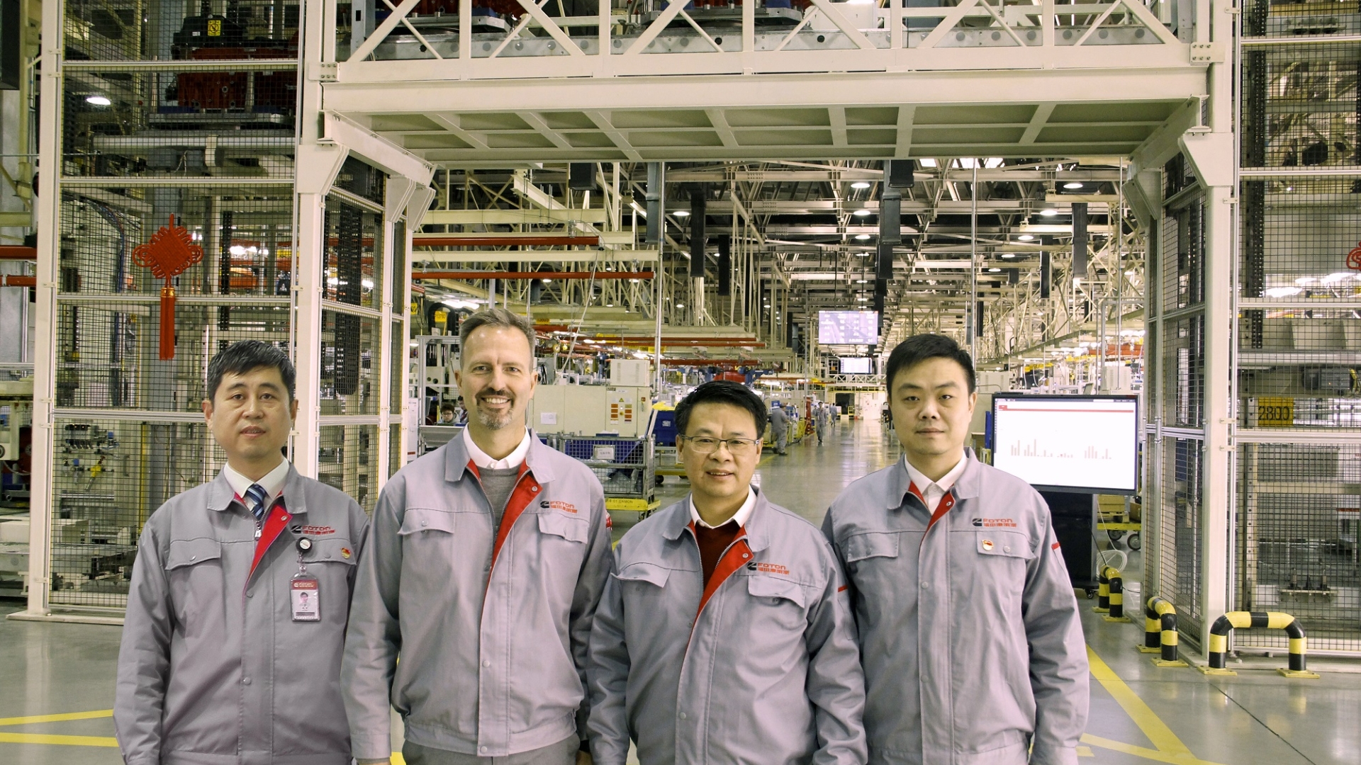 The Beijing Foton Cummins Engine Company is using technology to improve a host of issues from quality to customer satisfaction. The plant’s leadership, left to right, includes Zhao He, Manufacturing Engineering Leader; Miguel Kindler, Plant Manager; Chen Hua, General Manager; and Silence Chen, IT Leader.