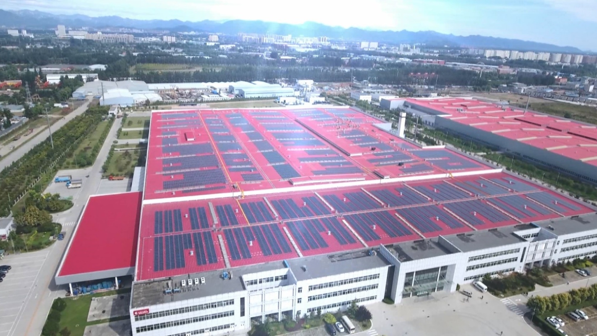 The Beijing Foton Cummins Engine Plant (above) in Beijing, China, is the largest of Cummins’ 12 completed solar installations. Work will begin soon on the plant’s second building (upper right).