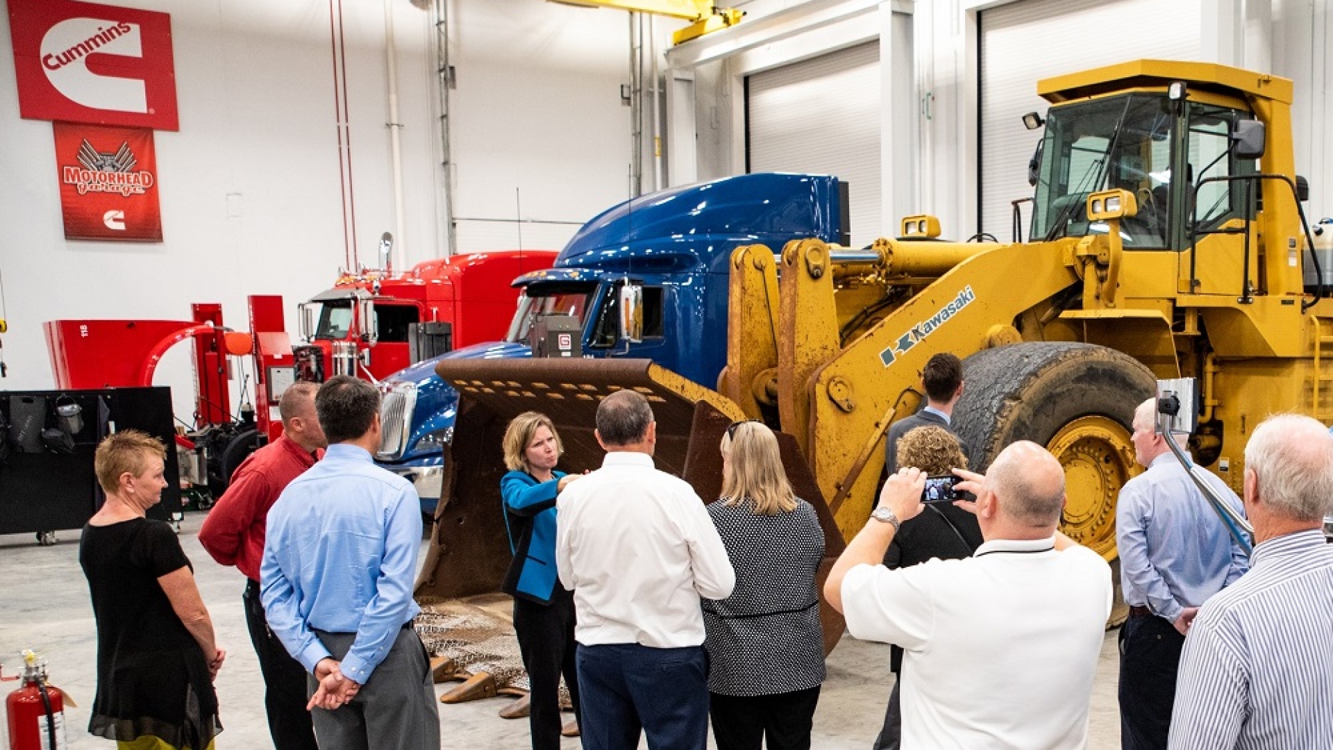 Vice President and Chief Technical Officer Jennifer Rumsey leads a tour at the new Cummins Machine Integration Center.