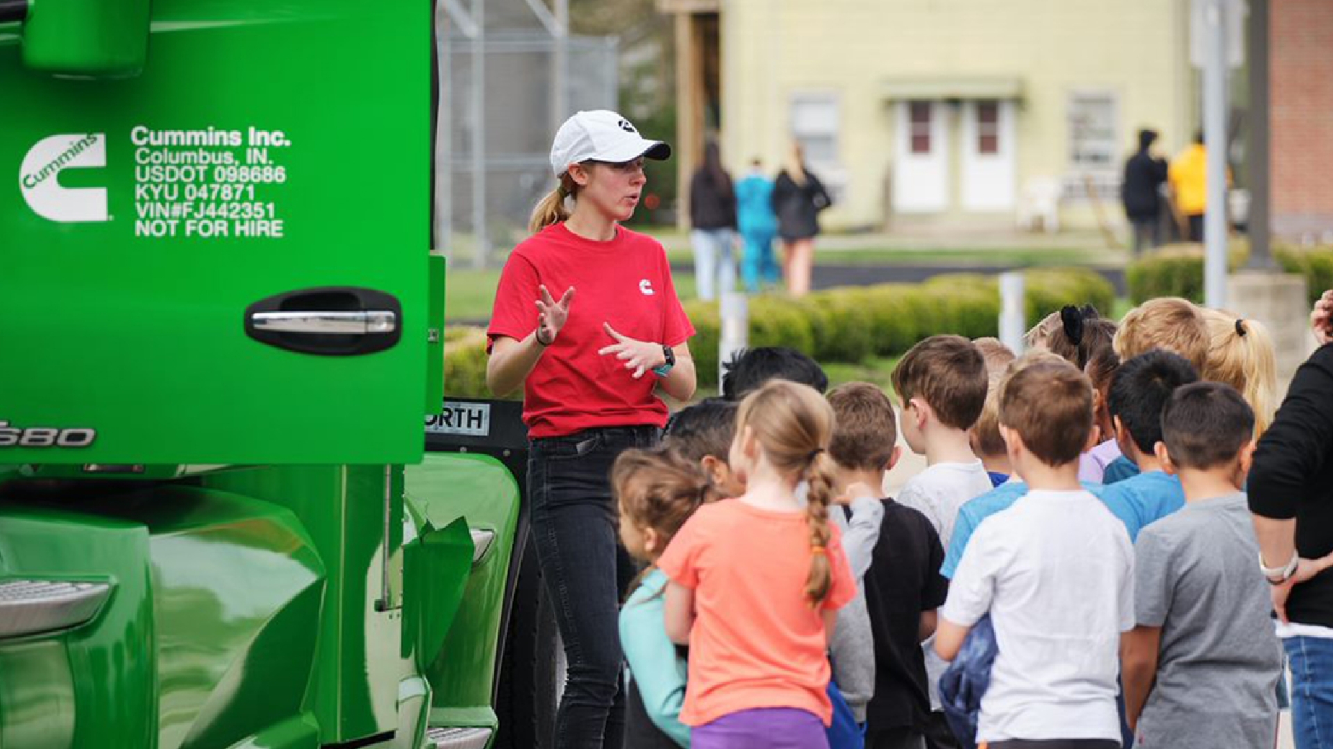 Cummins engineers teaching students about Cummins powered products