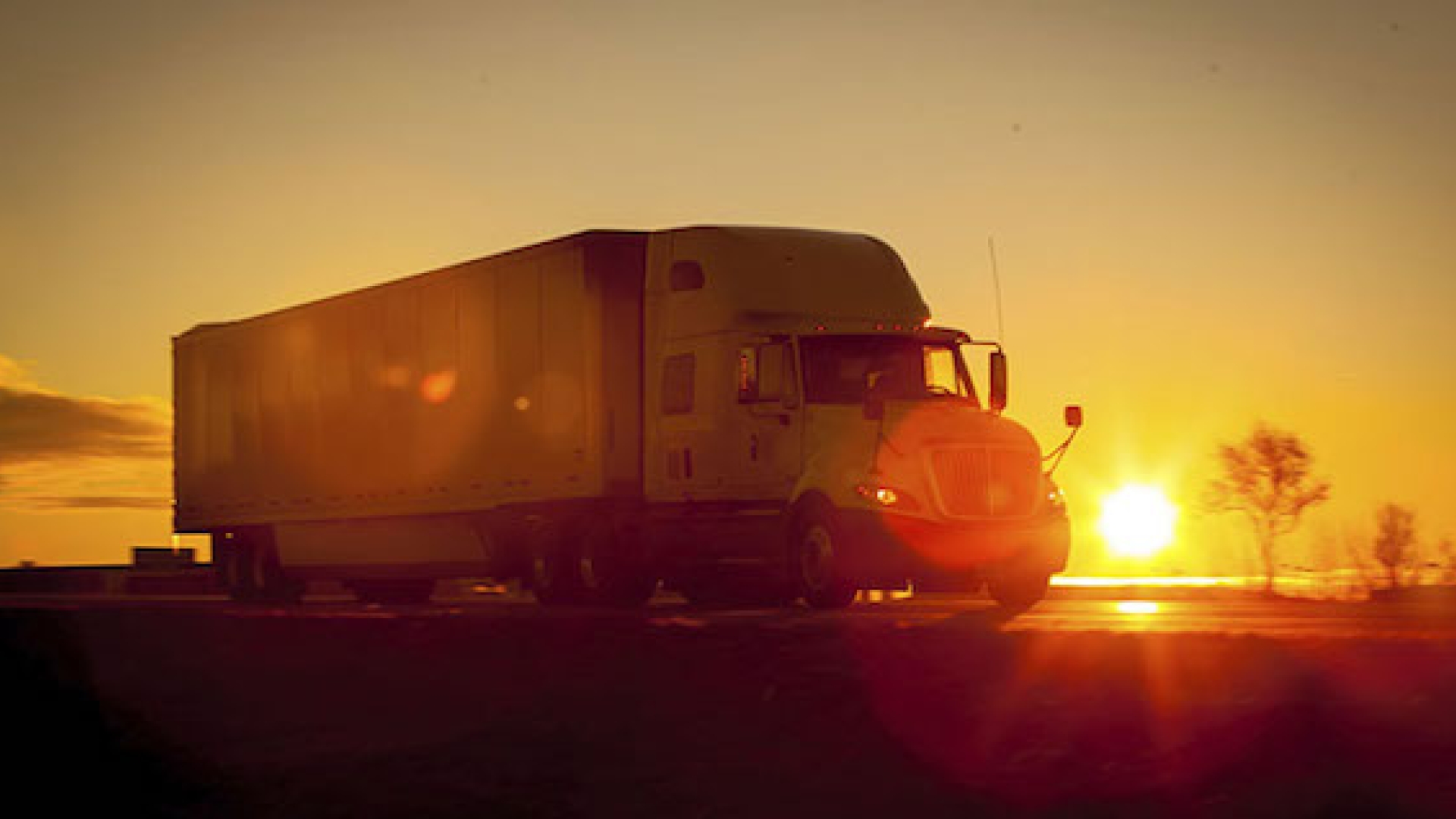 semi-truck-highway-sunset