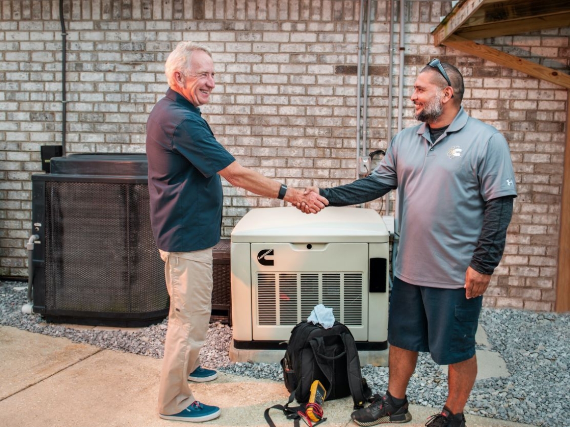 generator technician helping customer
