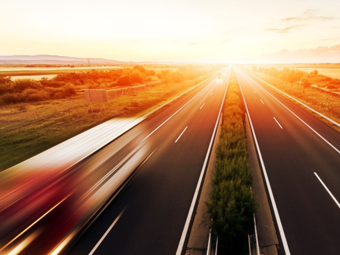 trucks in motion on highway