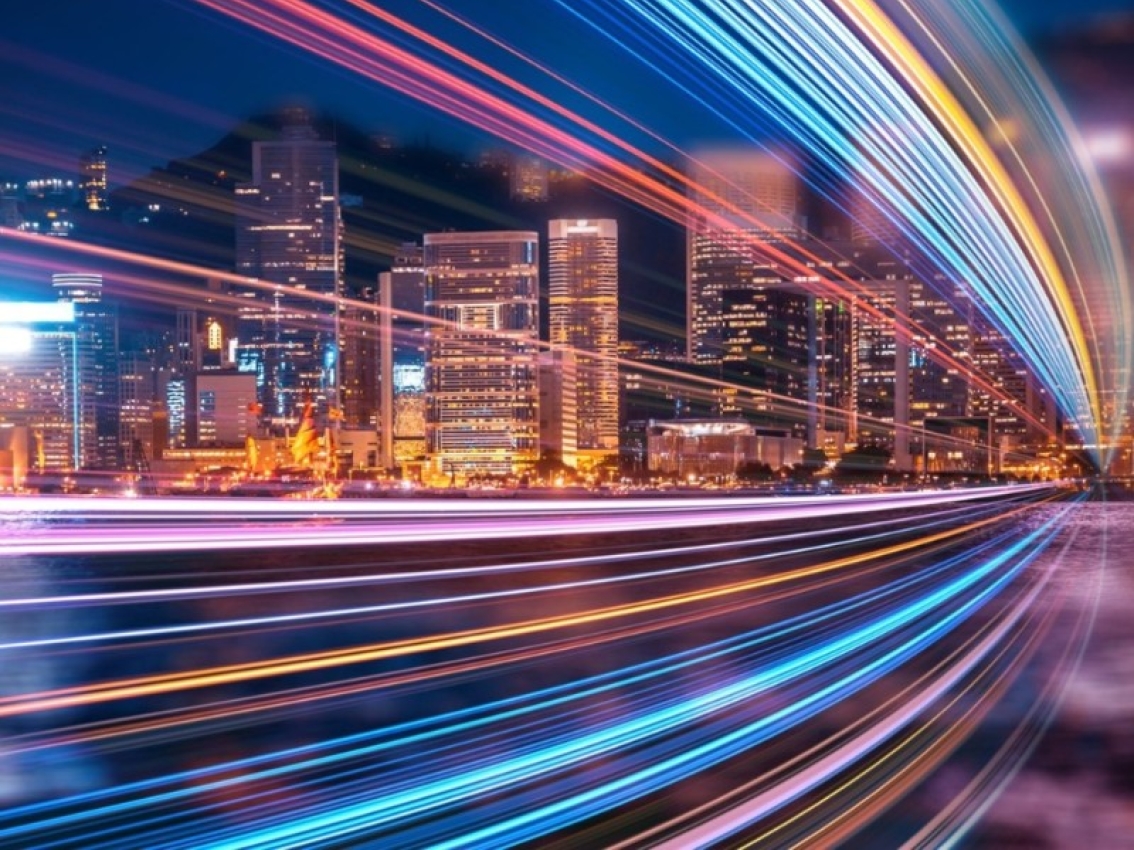 City with glowing lights connecting buildings