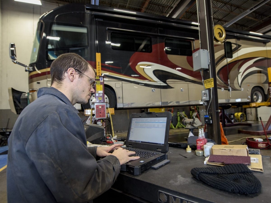 service technician working on rv