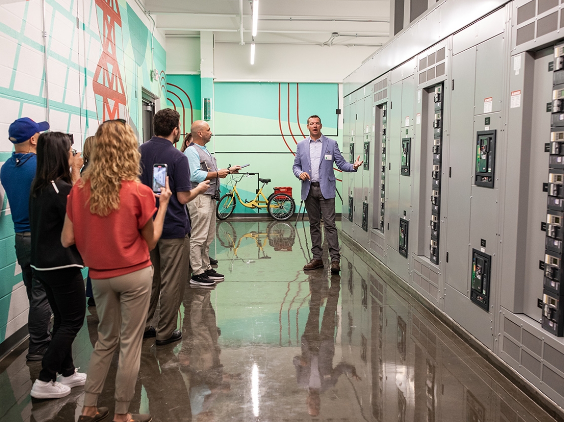 group getting tour at power integration center